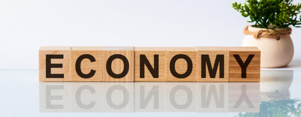 Tiles spelling "ECONOMY"